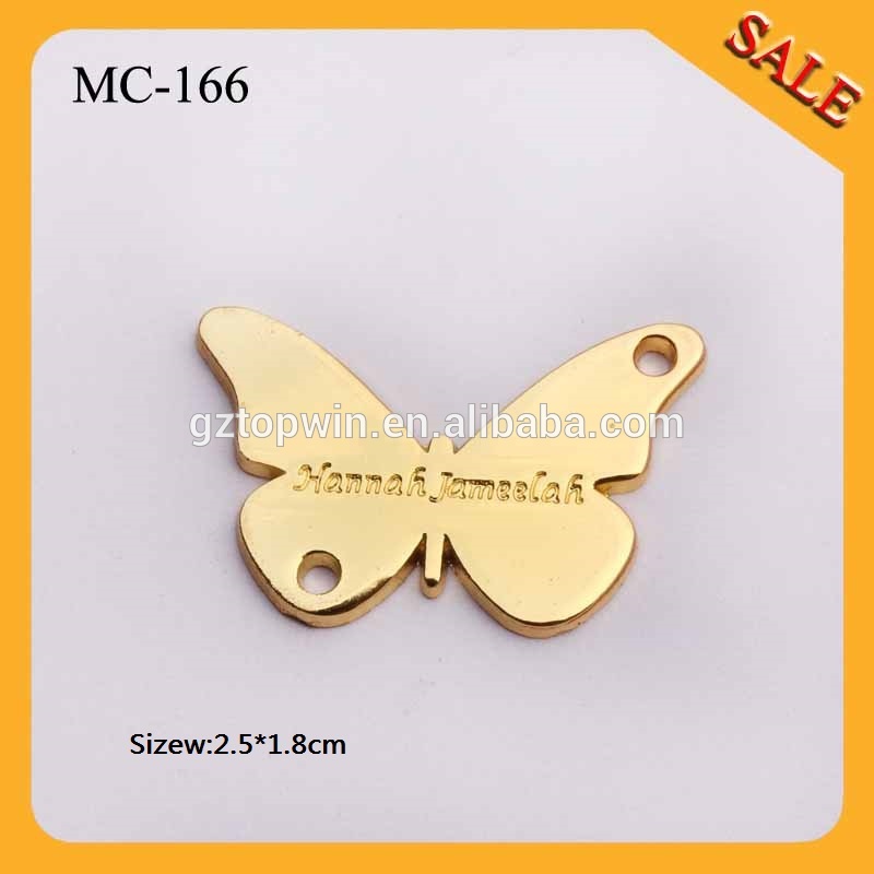 金蝶mc166を模倣するデザインのoemロゴ刻印金色のメッキ金属衣類タグ-アパレル副資材　ラベル問屋・仕入れ・卸・卸売り