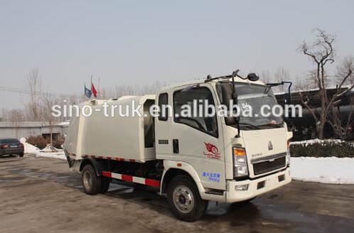 Sinotruk howo 4 × 2マニュアルトランスミッションタイプ4立方メートル拒否コレクタトラック-清掃車問屋・仕入れ・卸・卸売り